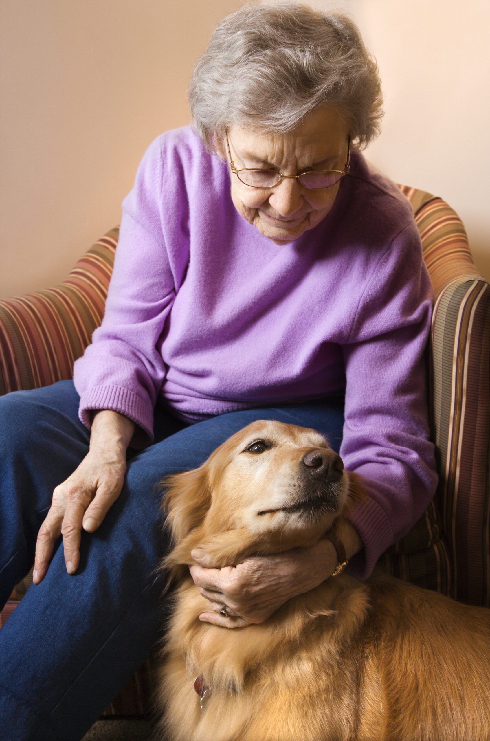 Elderly woman with her dog.